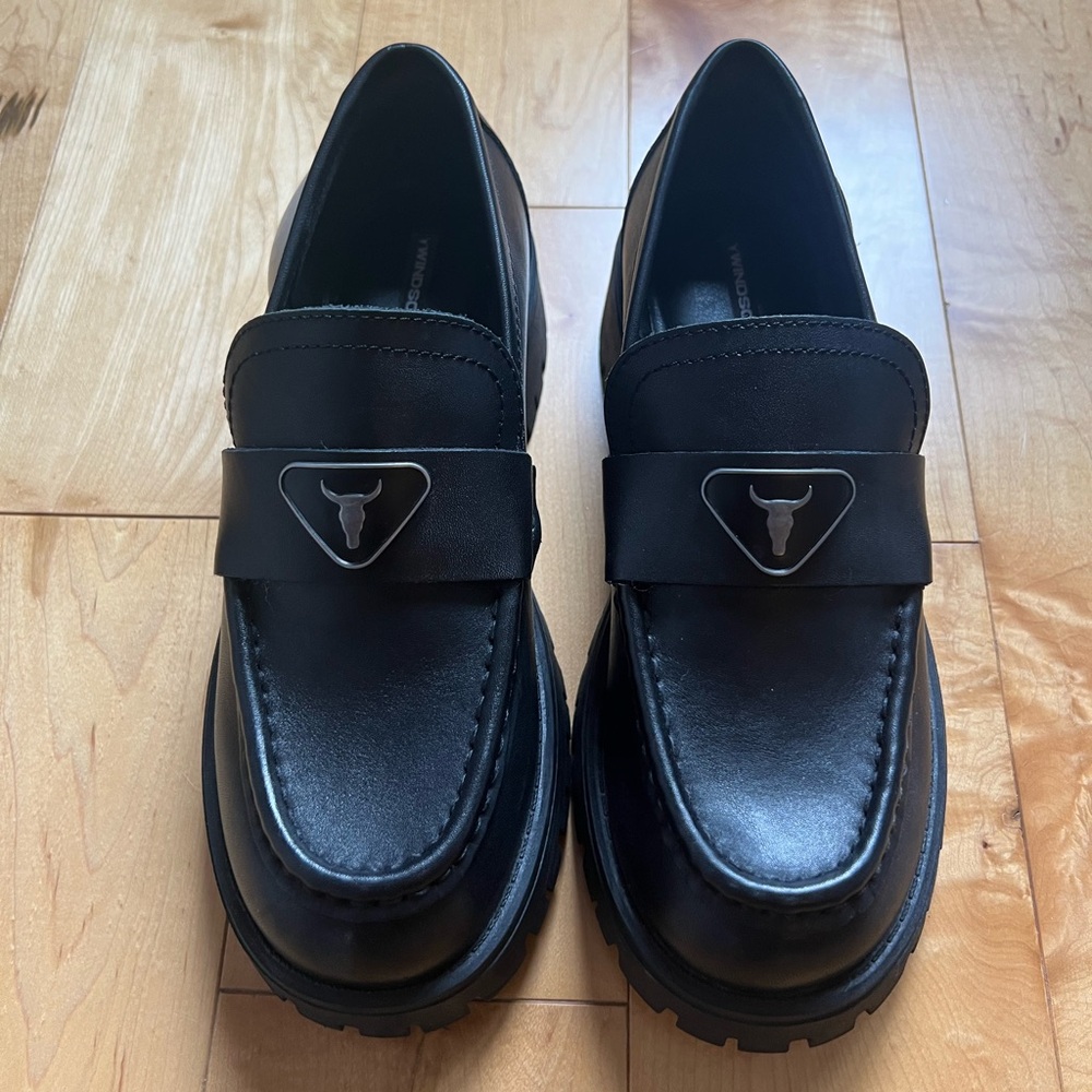 Windsorsmith Black Leather Lug-Sole Penny Loafers with Metal Bull Emblem